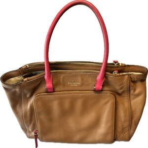 Kate Spade tan leather purse with pink handles.           17”Wx5”Dx10”H